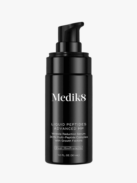 Medik8 Liquid Peptides Advanced Face Serum on a grey background