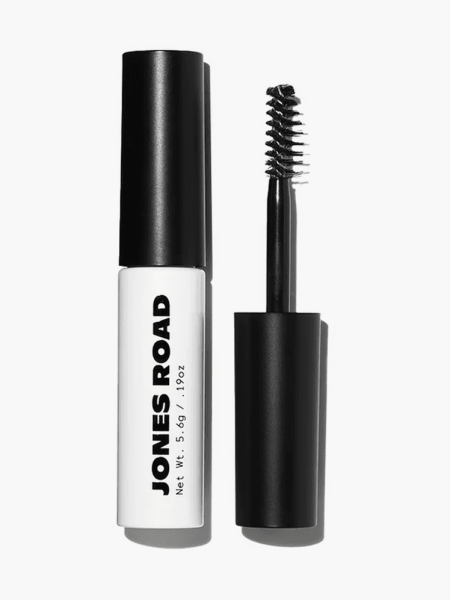 The Brow Gel in branded white tube with black cap and applicator brush on light gray background